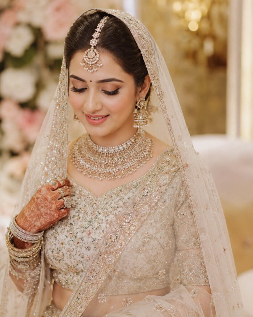 Bride with elegant reception makeup and hairstyle by Aesthetics Salon at Home in Dehradun